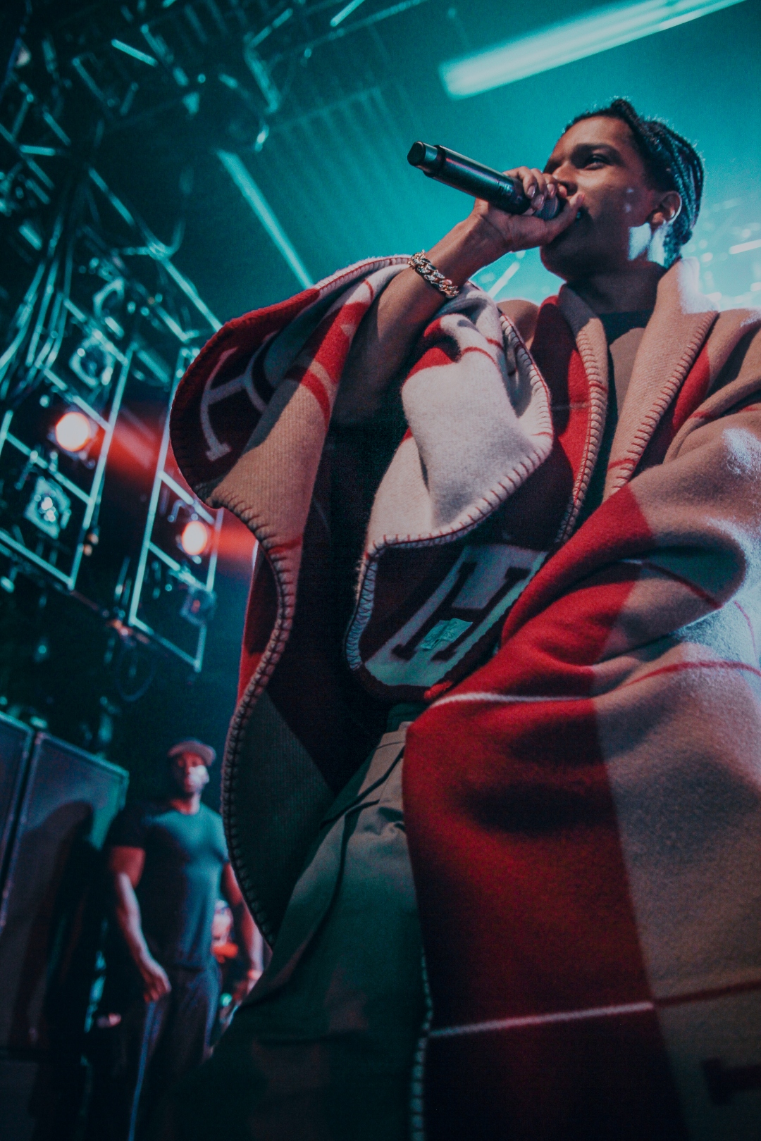 ASAP Rocky performing in blanket coat